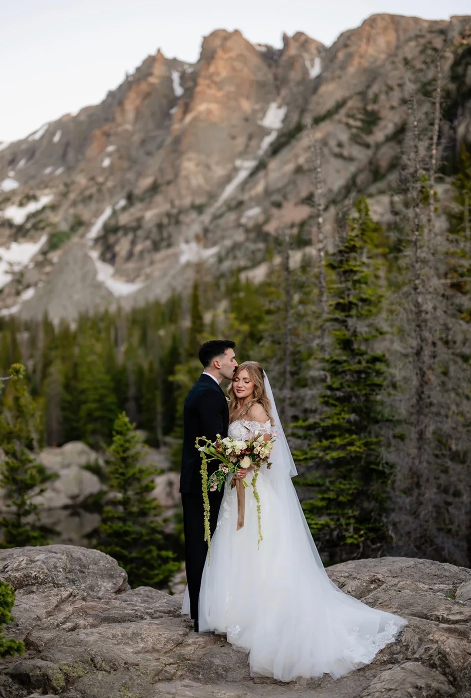 Bride and groom in the Rocky Mountains