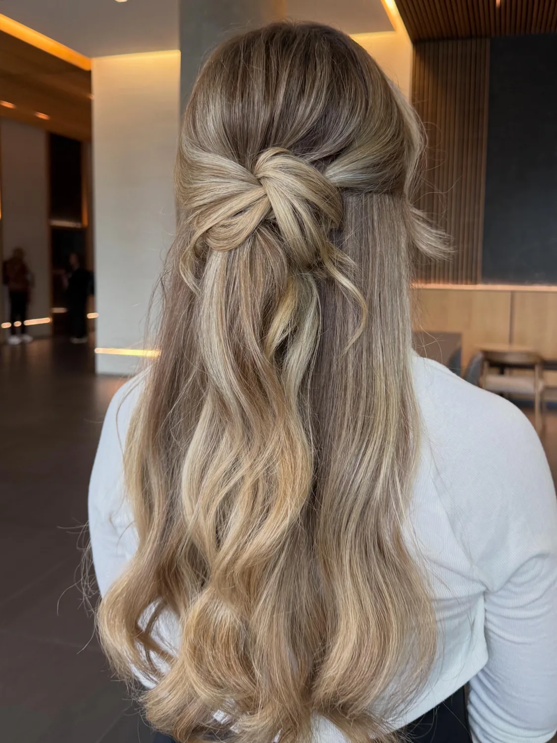 Half-up hair bow style