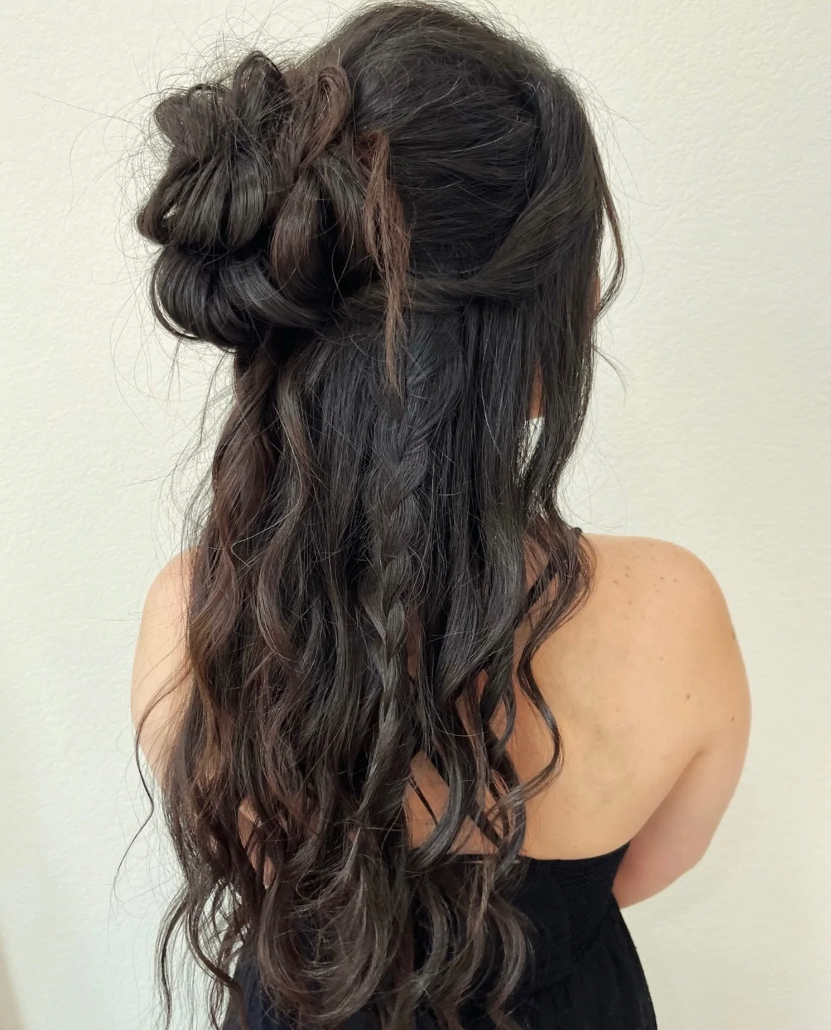 Dark braided half-up bridal style