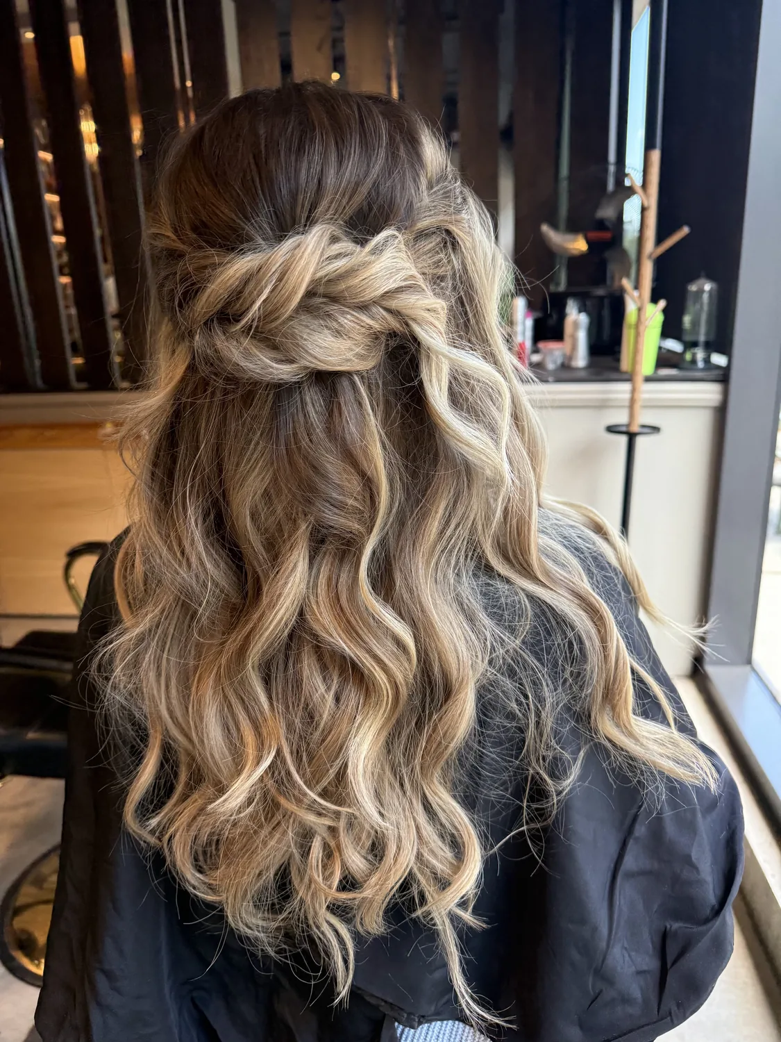 Braided half-up with waves